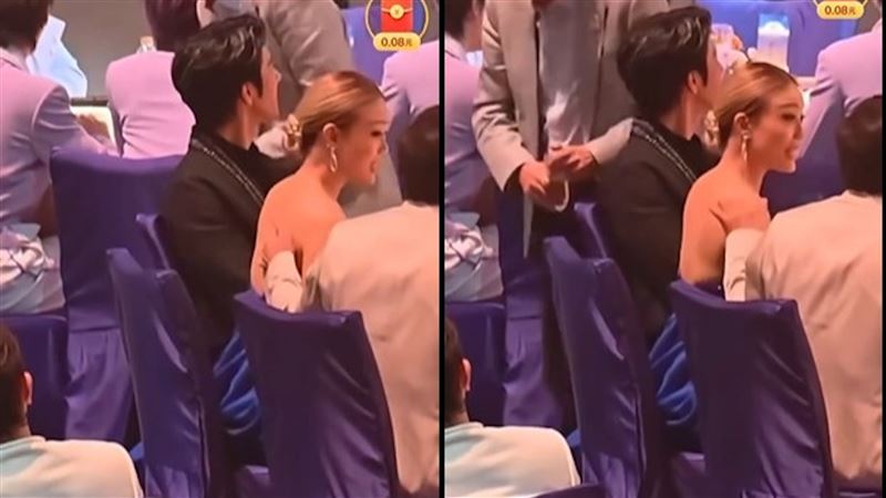 成龍原本搭在容祖兒椅背上的手，突然滑到她的美背上，並向上掃至其肩膀位置。（圖／翻攝自Threads）