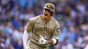 馬查多（Manny Machado）外卡G2棒打今永昇太。（圖／美聯社／達志影像）