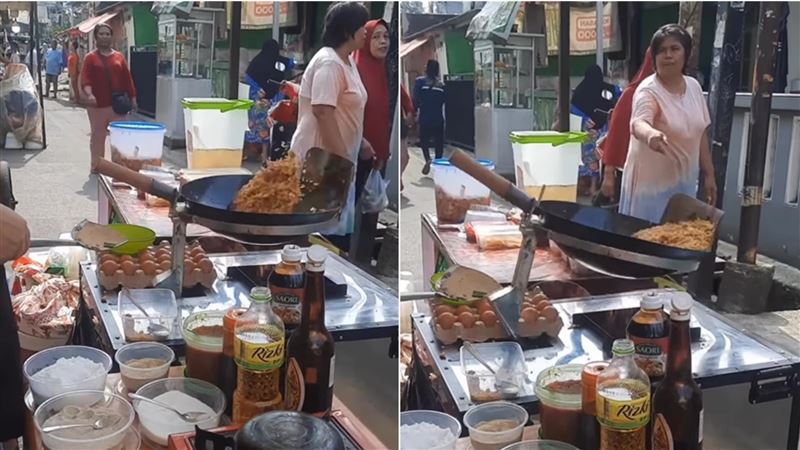 在印尼的街頭，炒飯機有節奏地料理，旁人被這特殊設計吸引。（圖／翻攝自IG）