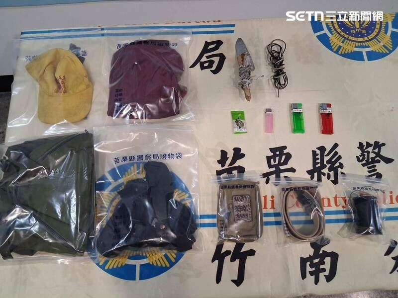21歲越南籍男大生行搶後徒步逃逸，遭警方圍捕時，持摺疊刀襲警，害員警下顎掛彩。（圖／翻攝畫面）