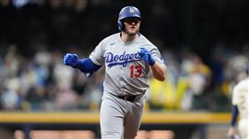 孟西（Max Muncy）炸裂陽春砲幫道奇追加保險分。（圖／美聯社／達志影像）