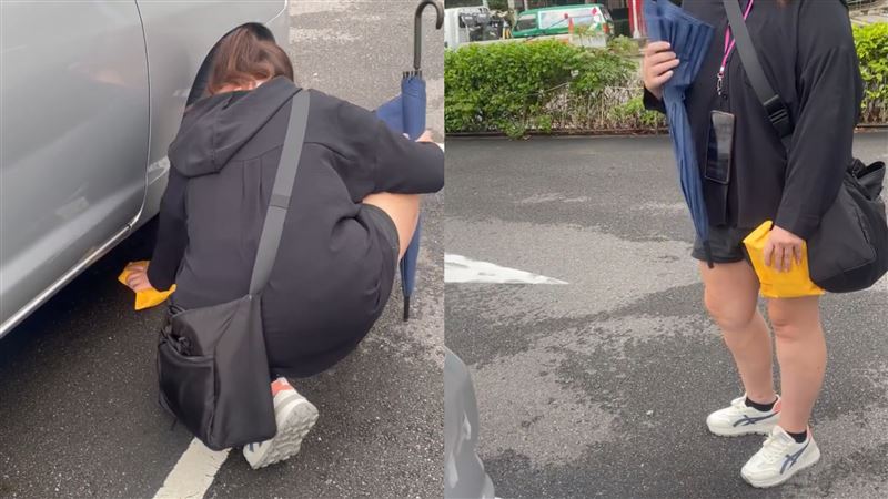 詭異女偷塞錢在別人車底。（圖／翻攝自爆料公社）