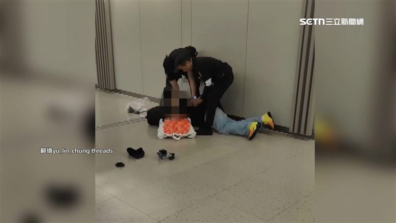 男子搭機喝醉鬧事,遭航警壓制