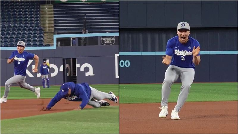 道奇總教練羅伯茲(Dave Roberts)與金慧成跑壘比賽「仆街」。(圖/翻攝自X平台 @Dodgers)