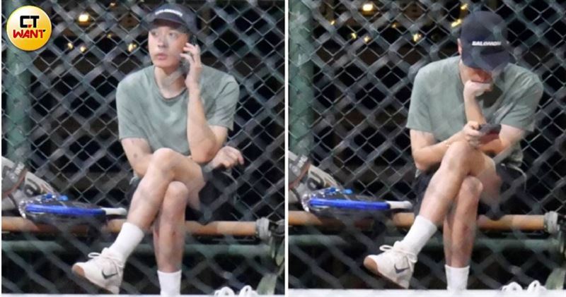 周湯豪轉性深夜跑球場，不過很多時間都在滑手機忙著回應社群上的粉絲問答。（圖／CTWANT）