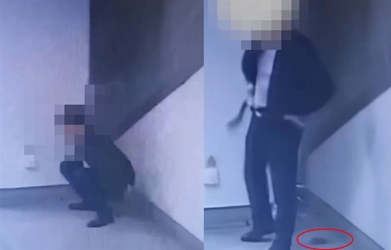 一名男子在廣西南寧地鐵站角落隨地大便，廁所就在旁邊不遠處。（圖／翻攝微博）