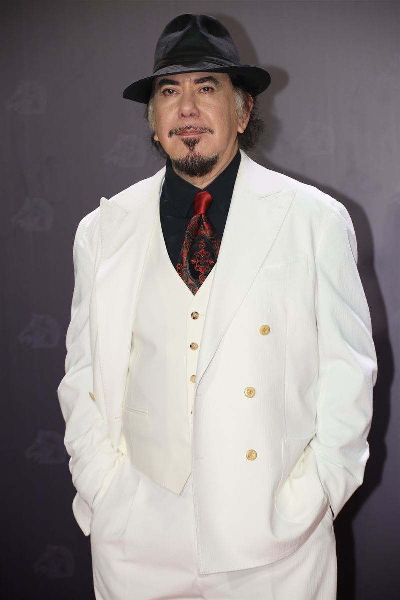 黃秋生以一身全白西裝現身。（圖／記者鄭孟晃、趙于瑩攝影）