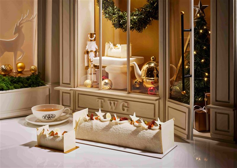 TWG Tea香草柑橘聖誕木柴蛋糕，注入「波本香草南非國寶茶」的柑橘香草香緹慕斯，層疊榛果海綿蛋糕與杏桃果漿，搭配柑橘杏仁酥餅，綻放節慶的華麗芬芳。（圖／品牌業者提供）