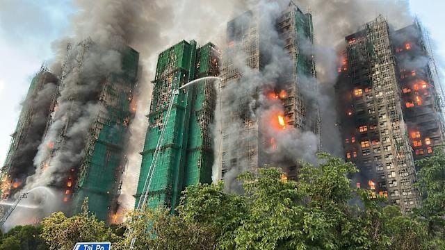 惡火延燒，多棟31層樓高樓陷入火海。（圖／翻攝自X平台 @abeleung）