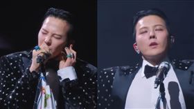 GD在舞台上頻頻調整耳機。（圖／取自MAMA YouTube）