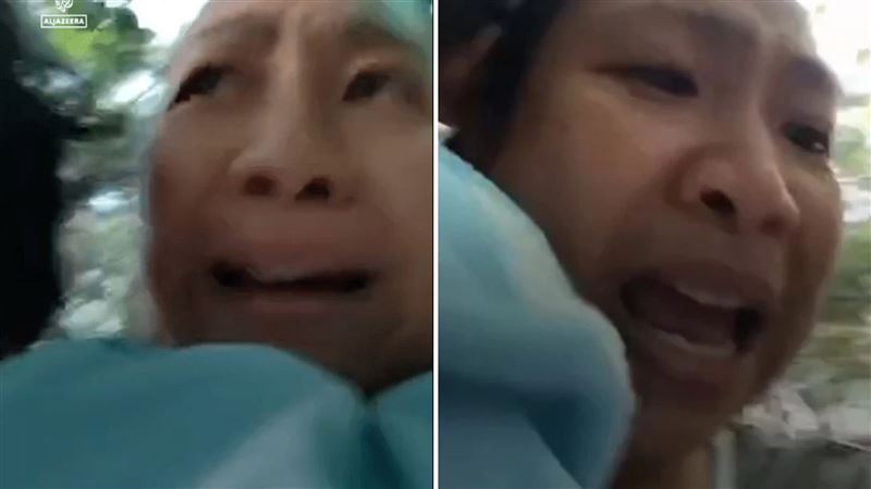 一名幸運逃出火海的菲籍看護卡塔貝當時抱著嬰兒，從23樓狂奔而下，同時還開直播通知同鄉趕緊逃命。（圖／翻攝畫面）