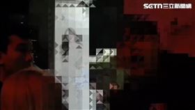 北市李男在夜店打烊後仍不願離去，不但咬傷安管人員，還對著警員嗆聲。（圖／翻攝畫面）