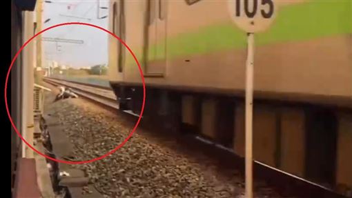 鬧事情侶闖入鐵軌！趴地翻滾爭吵畫面曝光