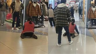 陸女賣場下跪畫面瘋傳　傳求尪幫買羽絨衣