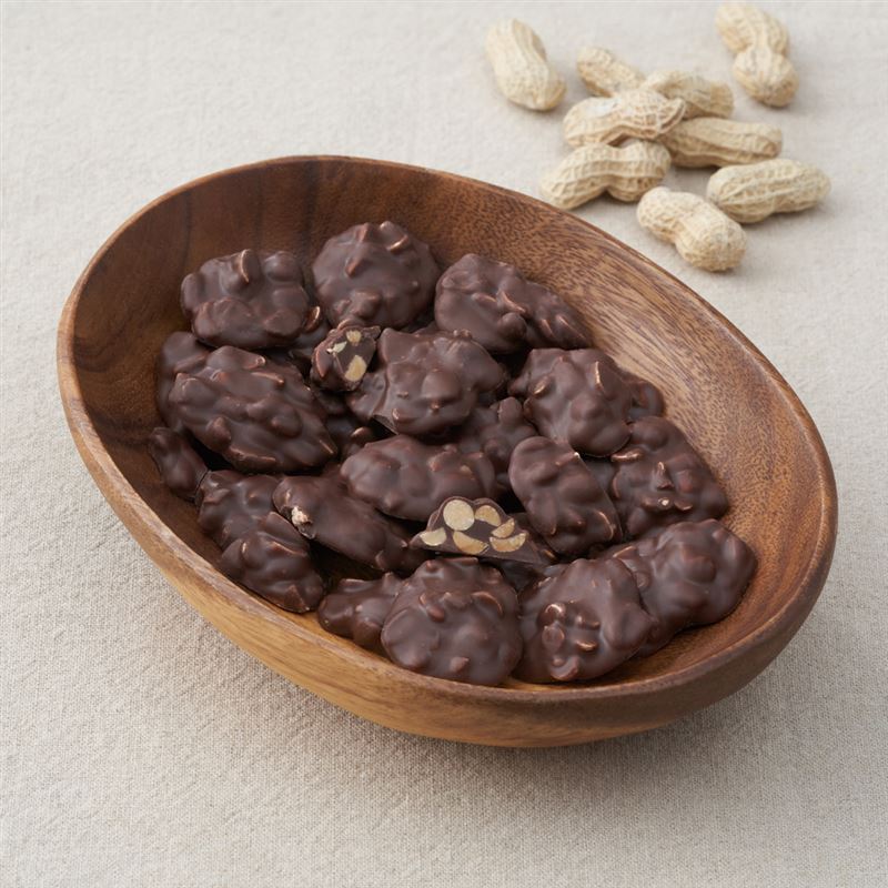 可可花生,99元:焙炒台灣去皮花生裹上牛奶可可,香脆花生搭配入口即化的香甜牛奶可可,讓人一口接一口。(圖/品牌業者提供)