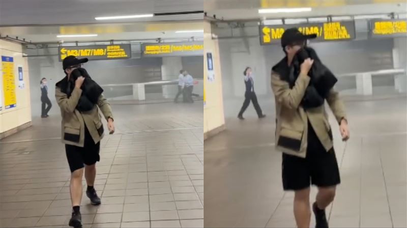 張文遮掩口鼻混逃生人群被保護著撤離。（圖／翻攝自Threads）