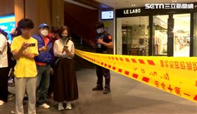 誠品南西店外警方分工，有的疏散人潮、有的上樓確認傷者。