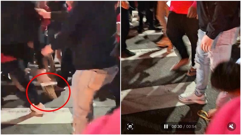 黑衣男的百萬金項鍊被扯掉，立刻被一名白衣男撿走。（圖／翻攝自宗教爆報臉書）