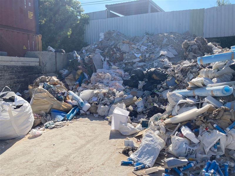 周姓男子勾結其它環保公司，以合法掩護非法廢棄物去向，台中地檢署共起訴104人。(圖／台中地檢署提供)