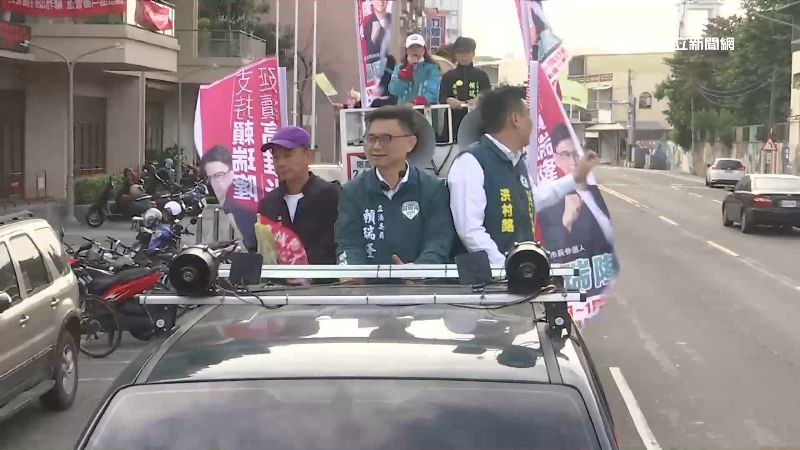 賴瑞隆（中）車隊掃街