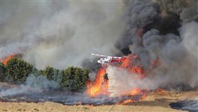 澳洲野火因高溫助長持續延燒。（圖／翻攝自X平台@IncrediblyBozza）