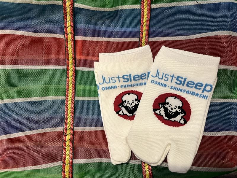 晶華會會員透過官網預訂「大阪慢遊・早鳥春夏」住房專案，入住期間可獲贈「限定版大阪心齋橋館設計款二指襪」乙雙。（圖／飯店旅宿業者提供）