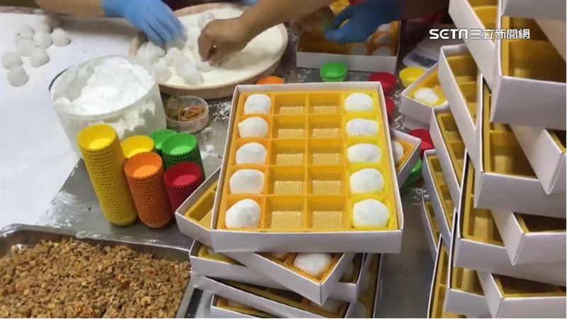 糖品代表「甜頭」，希望對方吃甜甜、說好話，緩和欠錢的尷尬氣氛。（示意圖／三立新聞網）