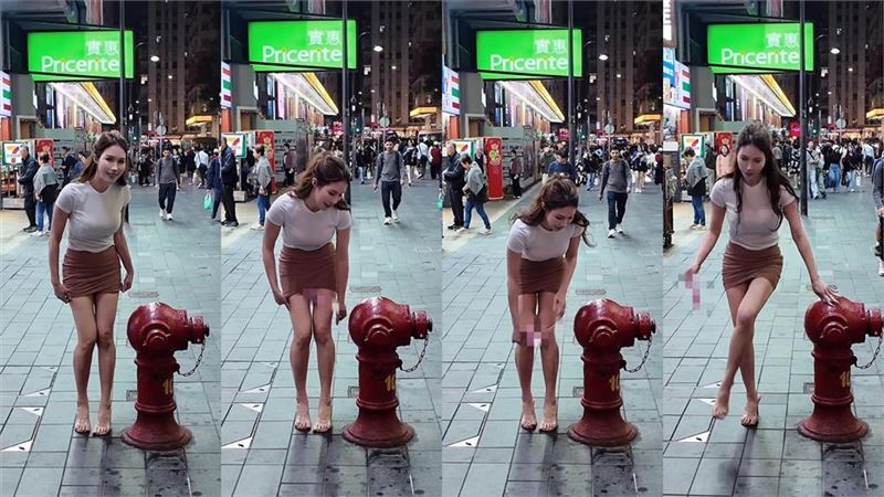 辛尤里還在過馬路時，將胸貼取出，胸前黑點一覽無疑。（圖／翻攝自辛尤里IG）