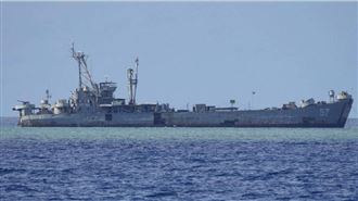 圖為故意擱淺坐灘在南沙群島仁愛礁的菲律賓海軍艦艇「馬德雷山號」（BRP Sierra Madre）。（圖／達志／美聯社）