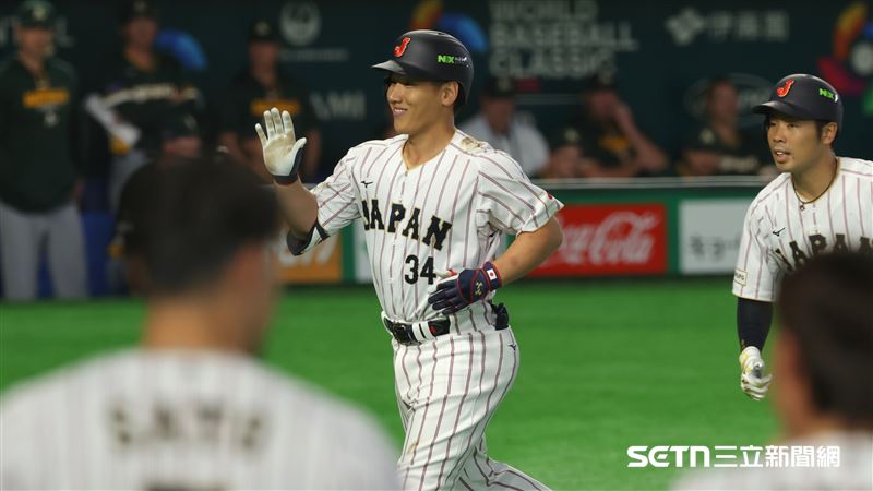 WBC日澳戰，日本隊右外野手吉田正尚炸裂超前2分砲。（圖／特派記者劉彥池攝影）