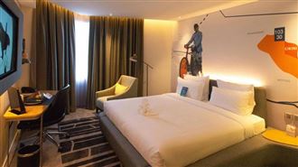 她住上萬景觀房「國旅好貴」網：炫耀文