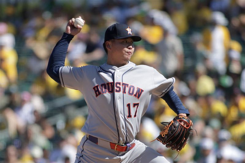 太空人隊台灣投手鄧愷威以長中繼之姿登板，接在今井達也之後，精簡用球投完2.1局無失分，幫助球隊以11比0大勝運動家隊。（圖／路透社／達志影像）