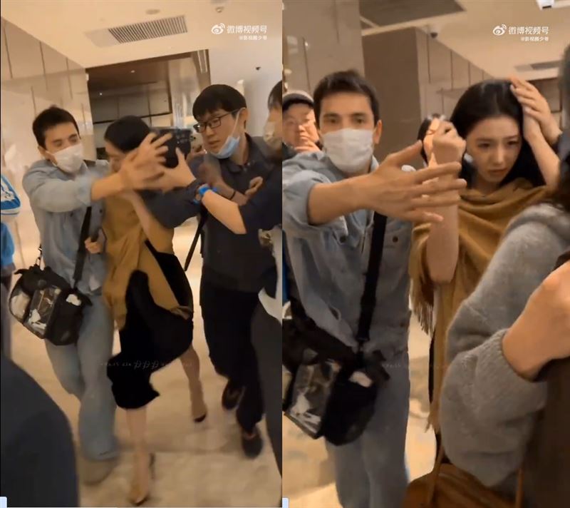 男子突然從劉浩存後方竄出，拿手機欲自拍時砸到劉浩存的頭。（圖／翻攝自微博）