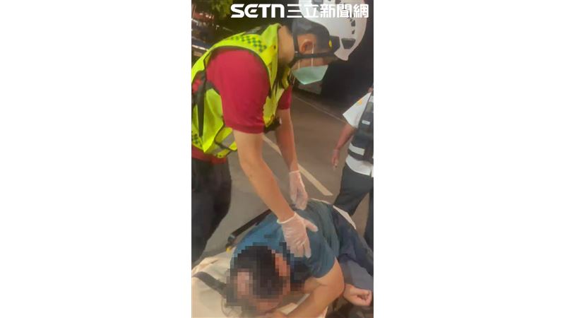 丁勇智痛到倒在地上。(圖/翻攝畫面)