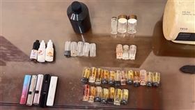查獲用以分裝依托咪酯分裝罐7罐、甘油3瓶、香精3瓶、電子菸彈19顆等毒品。（圖／翻攝畫面）