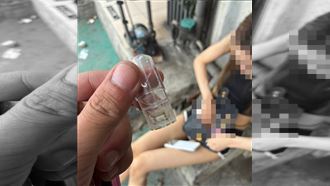 桃園熱褲妹癱坐路邊！吸喪屍菸彈神情恍惚