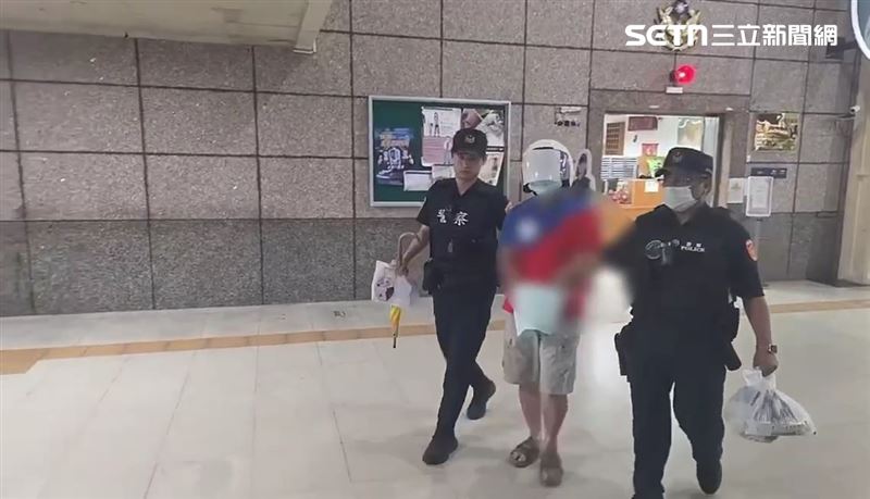 北市李男揮拳打傷鐵警被依妨害公務現行犯逮捕。（圖／翻攝畫面）