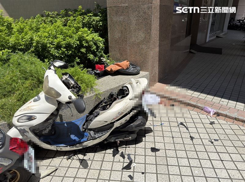 台中北區發生墜樓意外,女子墜落1樓砸在機車上,全身骨折命危送醫。(圖/翻攝畫面)