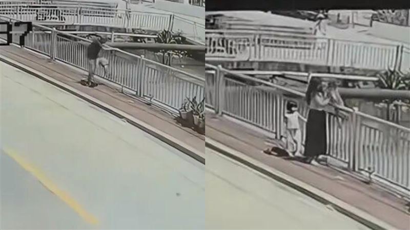 女童被扔下河,兩名路人合力救援。(圖/翻攝自微博)