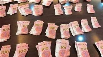 武漢農商銀行動員團隊耗時20多天，從上萬張紙幣碎片中逐一拼接、核驗。（圖／翻攝自微博）