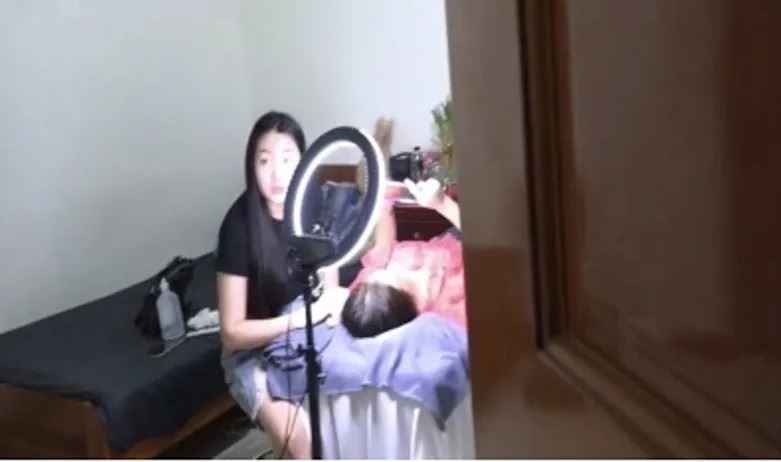 越南逃逸移工阮女變醫美名師,無照替同鄉施打玻尿酸「日賺10萬」。(圖/翻攝畫面)