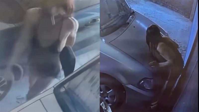 不速之客,穿著黑色薄紗內衣,肌膚若隱若現,腳踩高跟鞋四處張望,甚至大動作趴在引擎蓋謎樣晃動,詭異行徑持續10分鐘。(圖/翻攝自Threads @jolin91614)