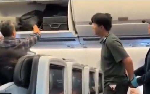 據消息指,一名上海男子在機艙內被逮捕,全家遭遣返。對此,官方稱是拼湊的假消息。(圖/翻攝自X平台 @TGTM_Official)