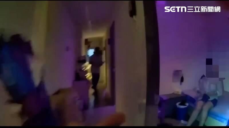 北市張男經營應召站遭破獲,警方當場查獲18名外籍女子及2名男客。(圖/翻攝畫面)