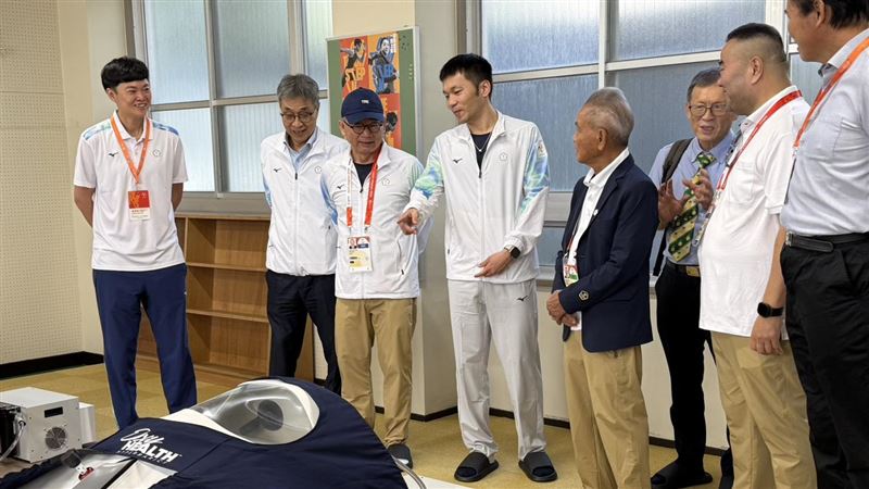 運動部長李洋(中)率隊參訪名古屋亞運中繼站。(圖/記者倪芝蓉攝影)