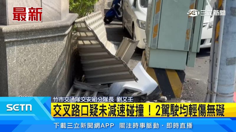 一旁牙科鐵門被撞得歪七扭八