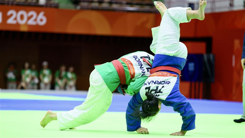 愛知名古屋亞運克拉術女子57公斤級準決賽,李宛庭(綠)勝王品淳。(圖/代表團提供)