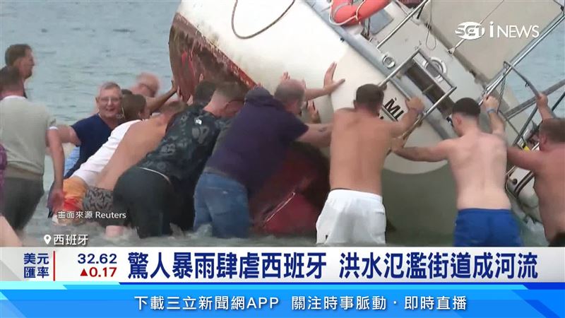 西班牙東部遭強風暴襲擊,破紀錄暴雨釀洪災,逾兩千人撤離。(圖/路透社)